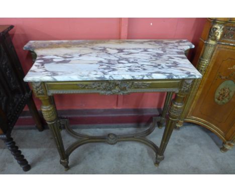 A French Louis XIV style carved gilt and marble topped console table 