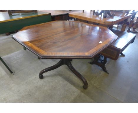 A George IV mahogany octagonal tilt centre table 