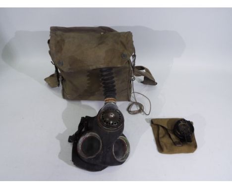 A World War Two (WW2 / WWII) chest respirator and haversack, 1941 and a Francis Barker &amp; Sons black lacquered brass march