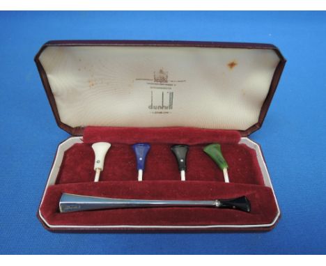 A cased silver cigarette holder with interchangeable mouthpieces, Birmingham 1962, Alfred Dunhill &amp; Sons
no nicks or dent