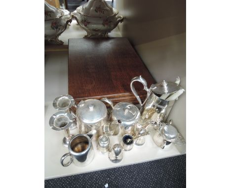 A selection of plated ware including cruet set, bud vases, tea ware, and a canteen of plated Community ware