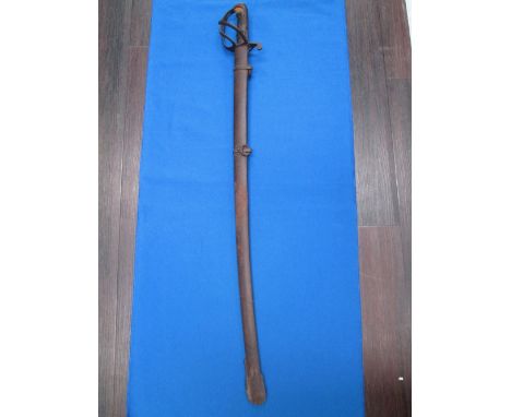 A late 19th century cavalry sword, having cast guard hilt of scroll design, cast scabbard, etc
CONDITION REPORT,Heaily rusted