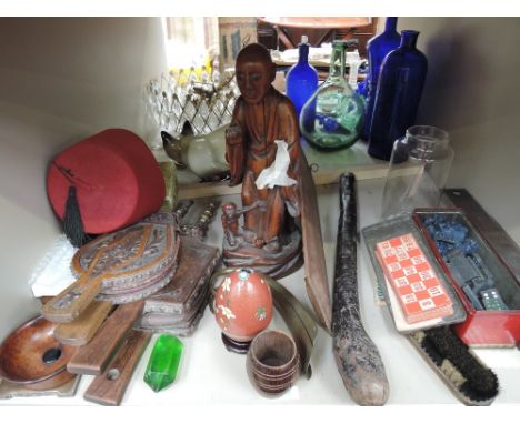 A selection of miscellaneous including fez, cloisonne egg, bellows, ethnic tribal stick, treen figure etc