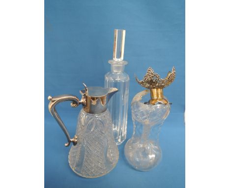 A glass decanter having HM silver collar, a cut glass and plated claret carafe and a Swedish stylised glass decanter by Orref