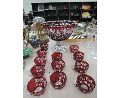 A Bohemian glass ruby and cut flash punch set with plated ladle 