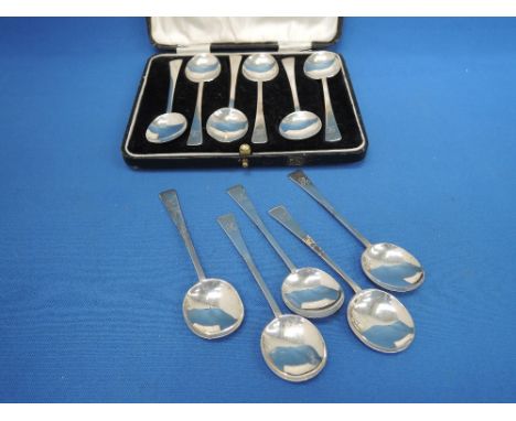 A cased set six silver coffee spoons and a matching part set of 5, all inscribed R to terminals,  Birmingham 1925/26, William