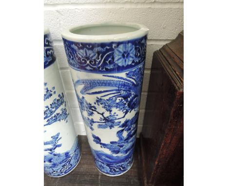 An early 20th century blue and white stick stand, of Chinese design, having pictorial decoration