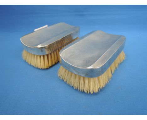Two silver backed gents brushes having engine turned decoration, Sheffield 1937, Walker & Hall
