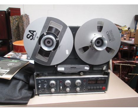 A Revox B77 reel to reel tape recorder, complete with instructions and spare reels etc
Condition: small switch on right hand 