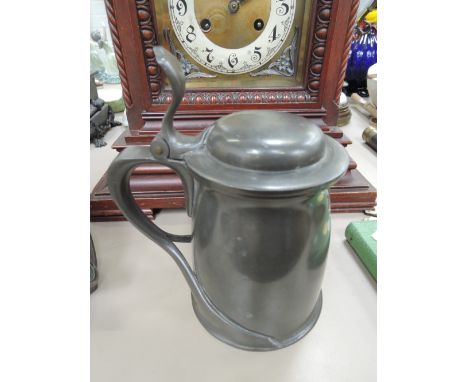 A Liberty's Tudric pewter lidded tankard having Art Nouveau design stamped 066