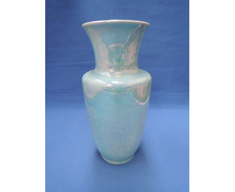 A Howson Taylor Ruskin vase having lustre decoration on turquoise ground
No lighting effect used
Condition: Surface markings 