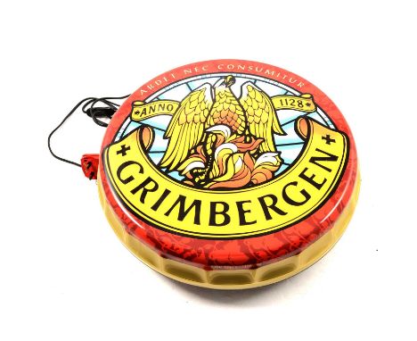 A selection of vintage and reproduction signs, including Walls Ice creams, Grimbergen light up sign and others.