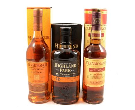 Three bottles of single malt Scotch whisky:Glenmorangie, "The Spirit of Tranquility" 12 year old, limited edition bottling, 4