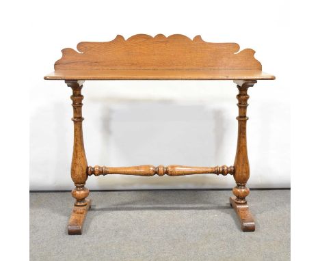 Victorian style oak console table, serpentine back above a rectangular top, baluster legs and turned rail, scrolled feet, wid