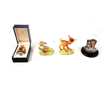 Four Royal Doulton, Halcyon Days and Goebel Disney and other figurines, to include Royal Doulton Disney Showcase Bambi, ltd e
