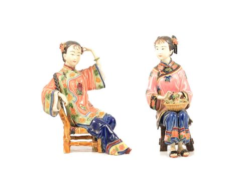 Pair of Chinese porcelain seated Geisha figures, impressed seal mark to undersides, old damages, 21.5cm.Qty: 2