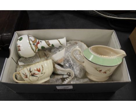 Box including Spode tea cups and saucers