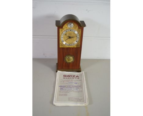 BOX CONTAINING SMALL CLOCK IN WOODEN CASE