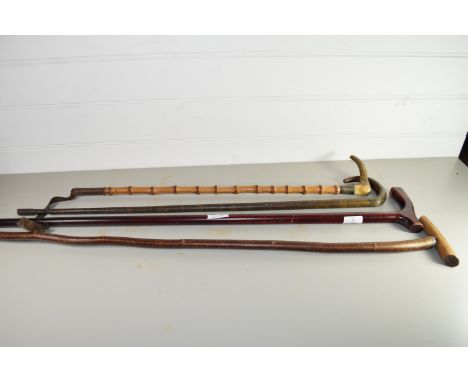 QTY OF WALKING CANES AND A BAMBOO RIDING WHIP