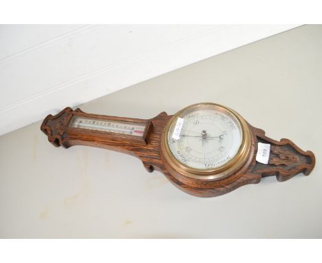 BAROMETER AND THERMOMETER IN OAK FRAME