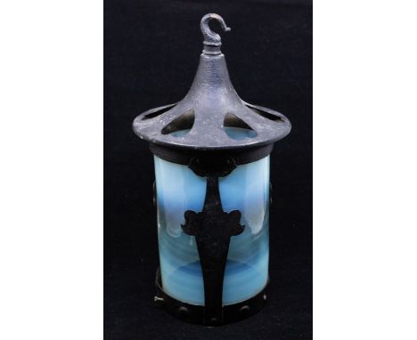 An early 20th Century Arts & Crafts designed light shade made of cast iron and Vaseline glass. The iron being of period styli