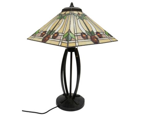A modern Tiffany style table lamp with stylised Glasgow rose design to the shade on a metal body. Height approx 65cm.