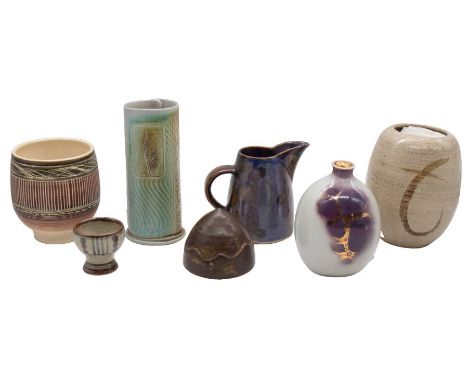 A collection of mixed Studio Pottery items to include; a late 20th Century May Ling Beadsmore abstract cylindrical vase with 