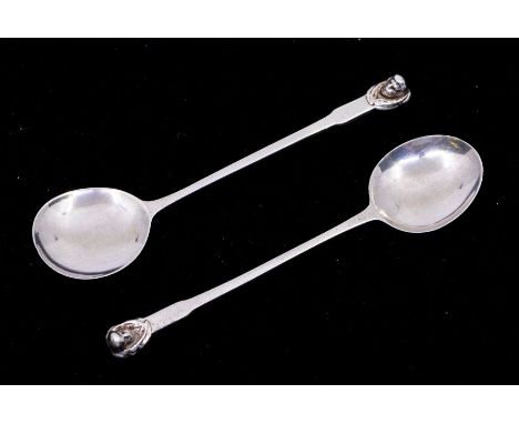 Dryad Art Metal Works of Leicester - A pair of Arts and Crafts silver spoons, each with circular bowl and tapering stem, with