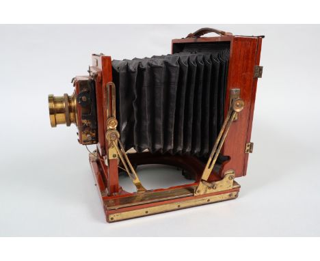 A Houghtons Ensign The 'Victo' Half-Plate Field Camera, circa 1905, triple extension, with rear screen, chamfered bellows, Th