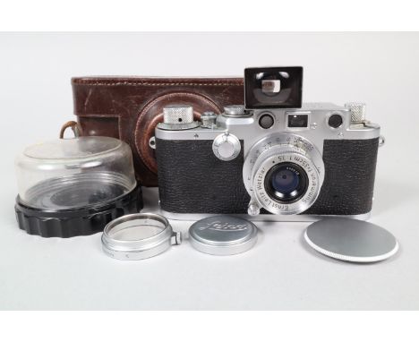 A Leitz Wetzlar Leica IIIf Camera, black dial, serial no 589162, 1951-52, shutter working, sluggish/sticking on slow speeds, 