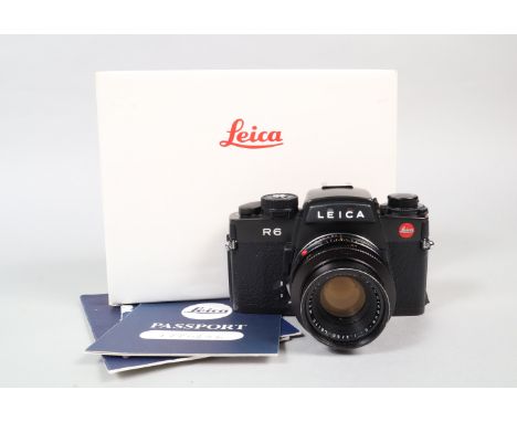 A Leica R6 Camera, Leica Gmbh, made in Germany, serial no 1770296, 1989, shutter working, meter responsive, body G, some pait