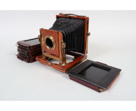 A 'National' Quarter-Plate Field Camera, circa 1900, double extension, no lens or rear screen, maker's plate states 'The 'Nat