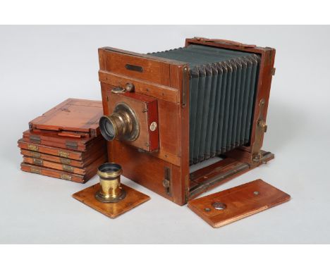 A 7 x 5in Mahogany Tailboard Camera, body F, dull finish, retailer's plate states CASA LEPAGE DE MAX GLUCKSMAN BUENOS AIRES -