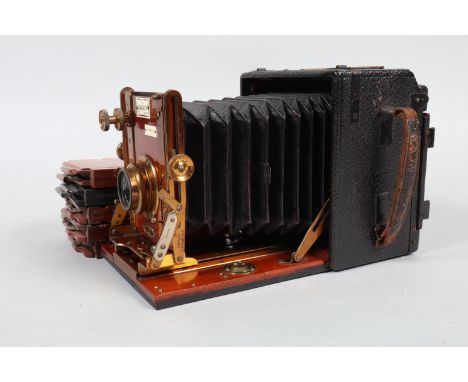 The 'Sanderson' De Luxe Quarter-Plate Hand &amp; Stand Camera, serial no 20634, circa 1909, body G, a Ross Wide Angle Anastig