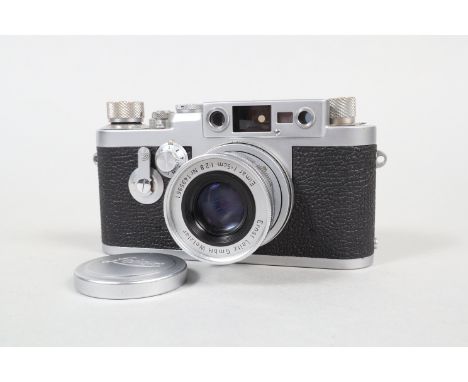 A Leitz Wetzlar Leica IIIg Camera, serial no 879954, 1957, shutter erratic/sluggish in slow speeds, functions okay in self ti