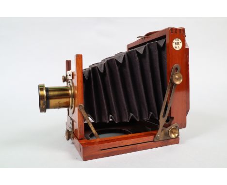 A Marlow Brothers Quarter-Plate Field Camera, circa 1895, maker's plate states 'MARLOW BROS. maker's BIRMINGHAM', retailer's 