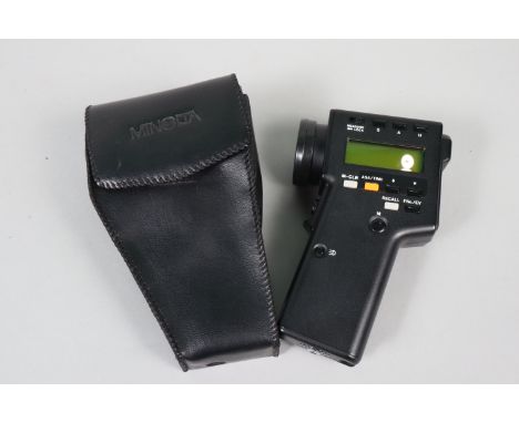 A Minolta Spotmeter M, powers up, appears to function as should, body G-VG, light scratch to handle, optics VG, in soft case