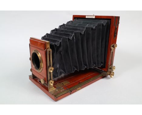 A Lancaster Patent Special Instantograph Half-Plate Tailboard Camera, black square-cornered tapered bellows, double extension