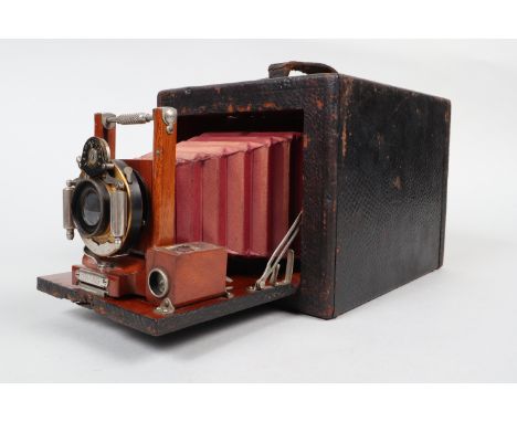 A Bullard Series A Folding Magazine Plate Camera, 4 x 5in format, circa 1898, body F, wear to leather, red bellows F, faded c