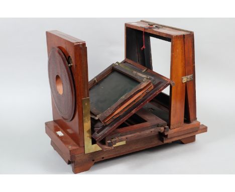 A Perken Son &amp; Rayment Mahogany Studio Camera and Other Cameras, a large incomplete camera body, 8 x 8in maximum plate si