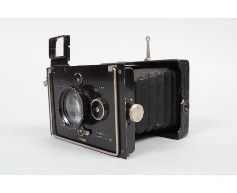 A Plaubel Makina (I) 6.5 x 9cm Strut Folding Plate Camera, body F, Compur dial-set shutter not working, Plaubel Anticomar 10c