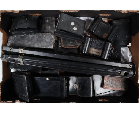 A Tray of Film Backs and Plate Holders, including roll film backs by Rollex and Rada, together with a large quantity of metal