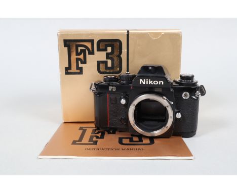A Nikon F3 SLR Camera Body, serial no 1366050, body F, ding to prism roof, some brassing, shutter working, meter reacts to li