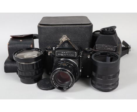 A Pentax 6x7 Camera Outfit, serial no 4012255, shutter tested without film, appears to work, body G, some brassing around str
