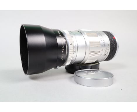 A Leitz Wetzlar 90mm f/2.8 Elmarit Lens, serial no 1807043, 1960, barrel G, light wear, elements G-VG, some internal dust, wi