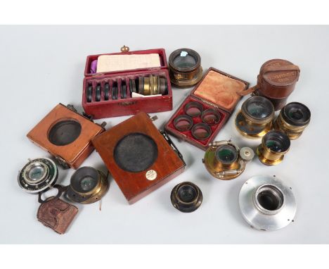 A Collection of Early Brass Lenses and Shutters, lenses include a T-P Beck Symmetrical, a Swinden Liverpool, a  brass lens wi