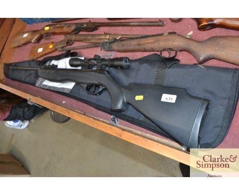 A Crossman Phantom .22 break barrel air rifle with telescopic sight, user manual and gun slip