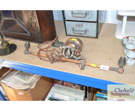 A copper rise and fall ceiling lamp 