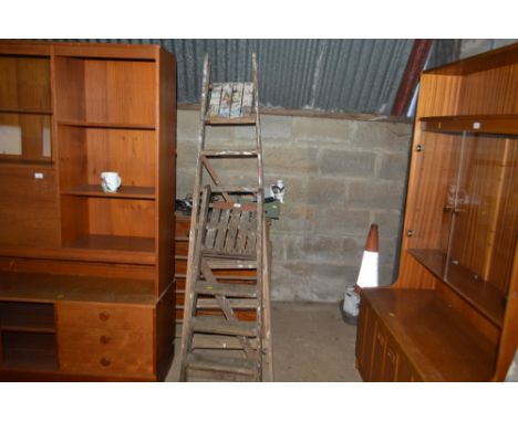 Two wooden step ladders