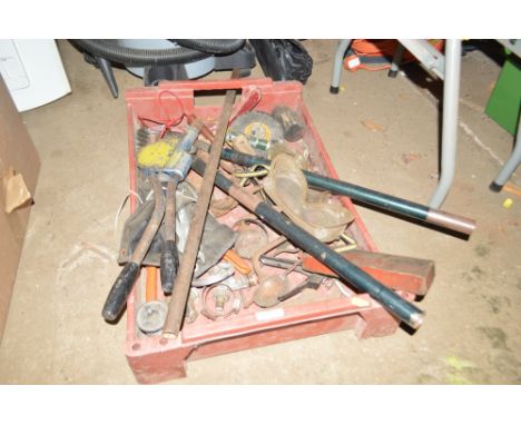 A tray of various hand tools